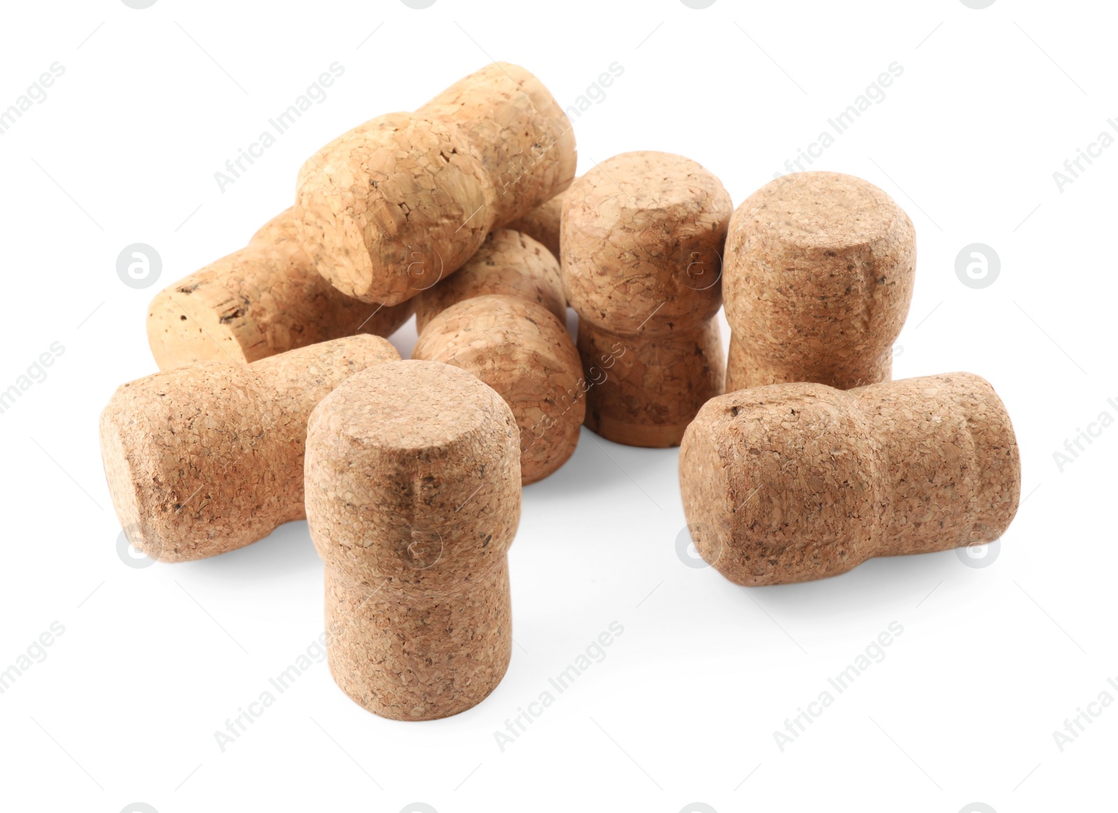 Photo of Many sparkling wine corks on white background