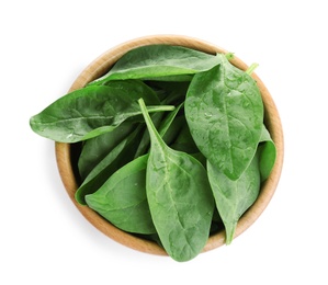 Photo of Fresh green healthy baby spinach leaves in wooden bowl isolated on white, top view