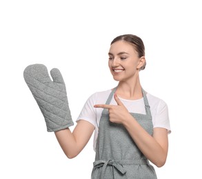 Photo of Beautiful young woman in clean apron with pattern and oven glove on white background