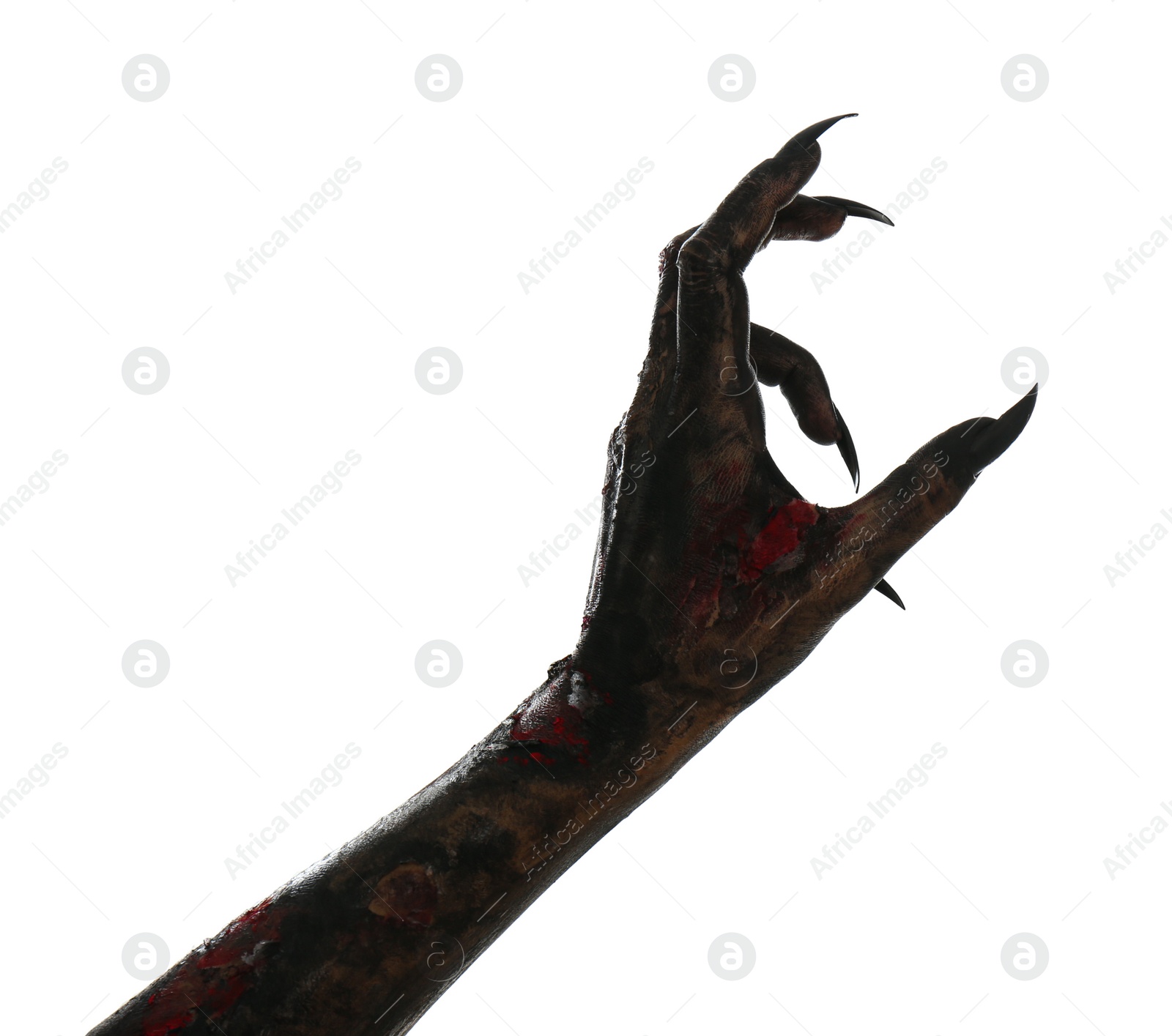 Photo of Scary monster on white background, closeup of hand. Halloween character