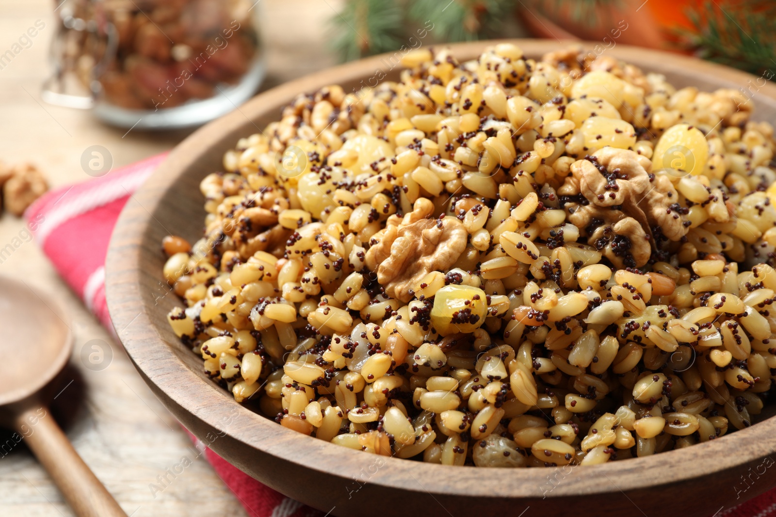 Photo of Traditional Christmas slavic dish kutia in bowl, closeup