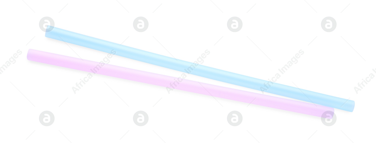 Photo of Color plastic cocktail tubes on white background