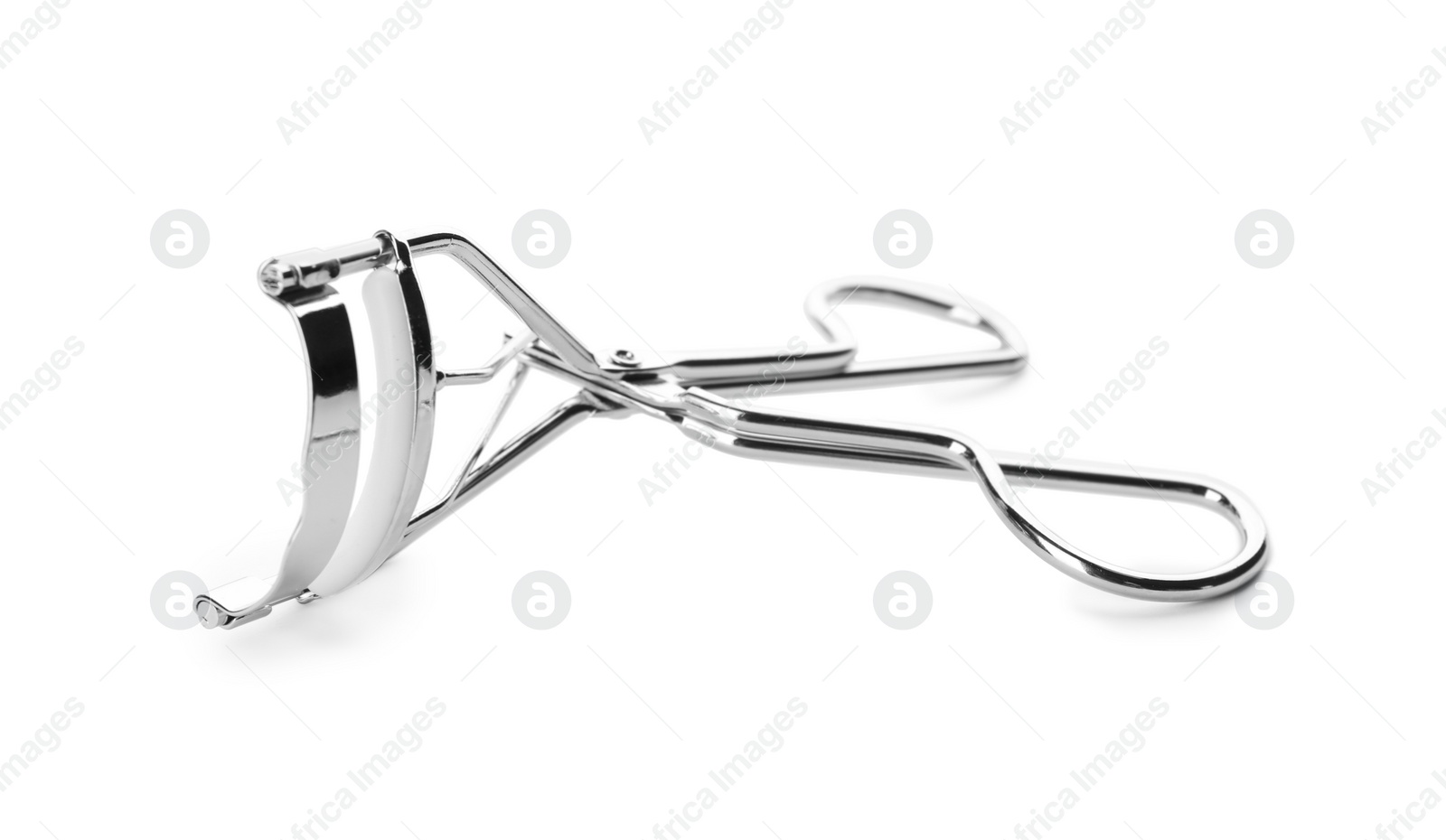 Photo of Eyelash curler isolated on white. Makeup tool