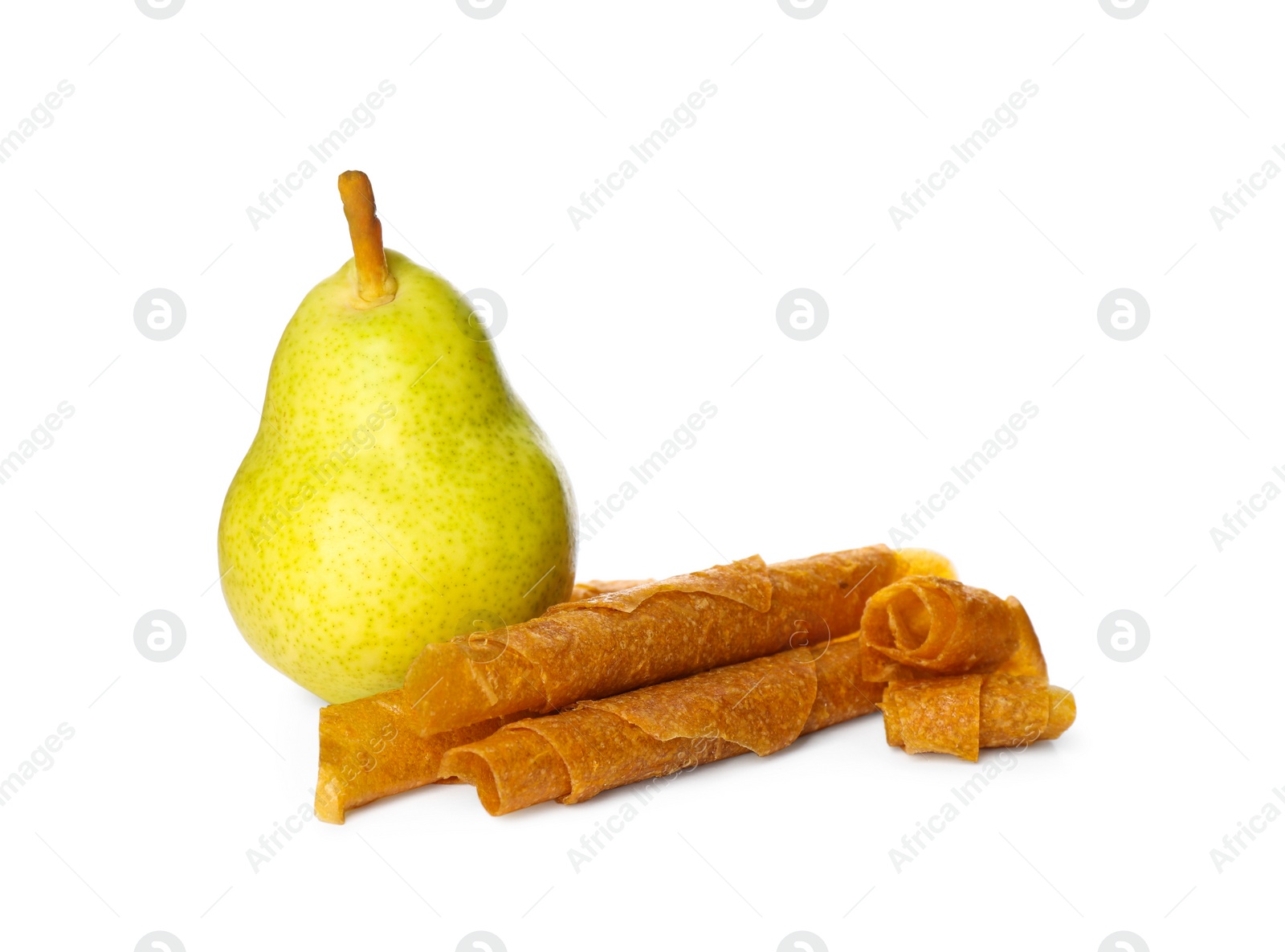 Photo of Delicious fruit leather rolls and pear on white background