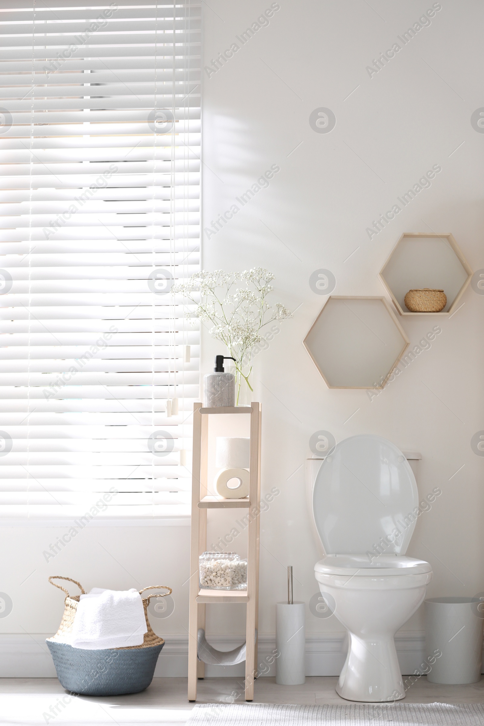 Photo of Modern toilet bowl in stylish bathroom interior