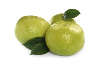 Fresh ripe sweetie fruits with green leaves on white background