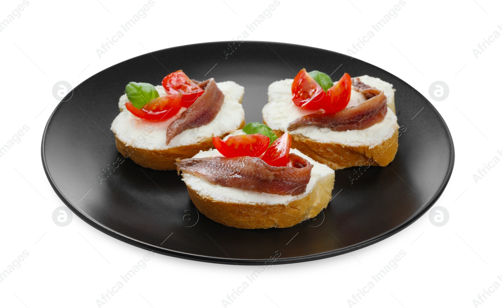 Photo of Delicious sandwiches with cream cheese, anchovies, tomatoes and basil on white background