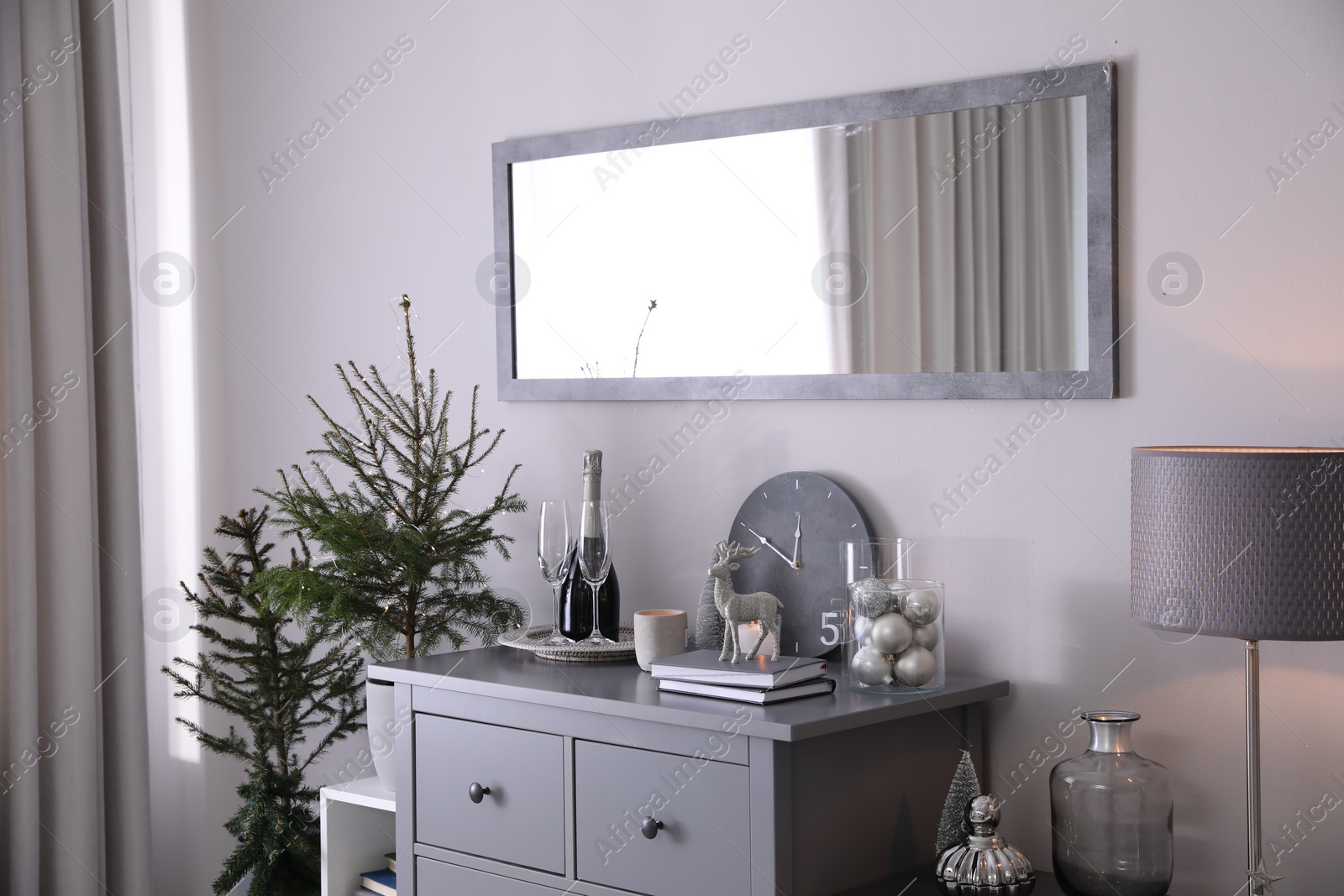 Photo of Beautiful room interior decorated for Christmas with potted firs