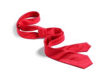 Photo of One red necktie isolated on white. Men's accessory