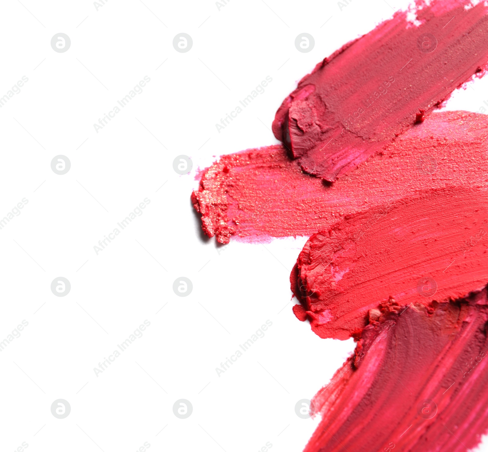 Photo of Lipstick smears isolated on white. Space for text