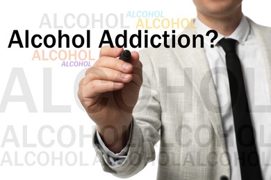 Image of Alcohol addiction? - We can help you. Closeup view of man with marker and inscription on white background