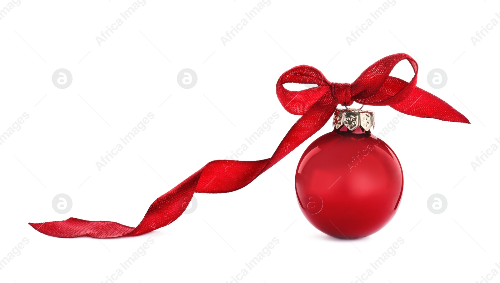 Photo of Beautiful red Christmas ball with ribbon isolated on white