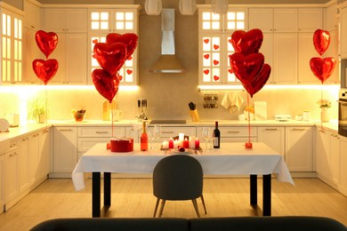 Romantic atmosphere. Cosy kitchen with set table decorated for Valentine day