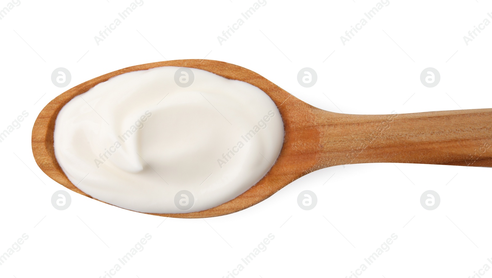 Photo of Wooden spoon with delicious sour cream isolated on white, top view