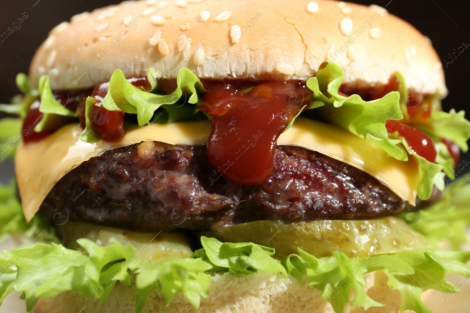 Photo of Burger with delicious patty on table, closeup