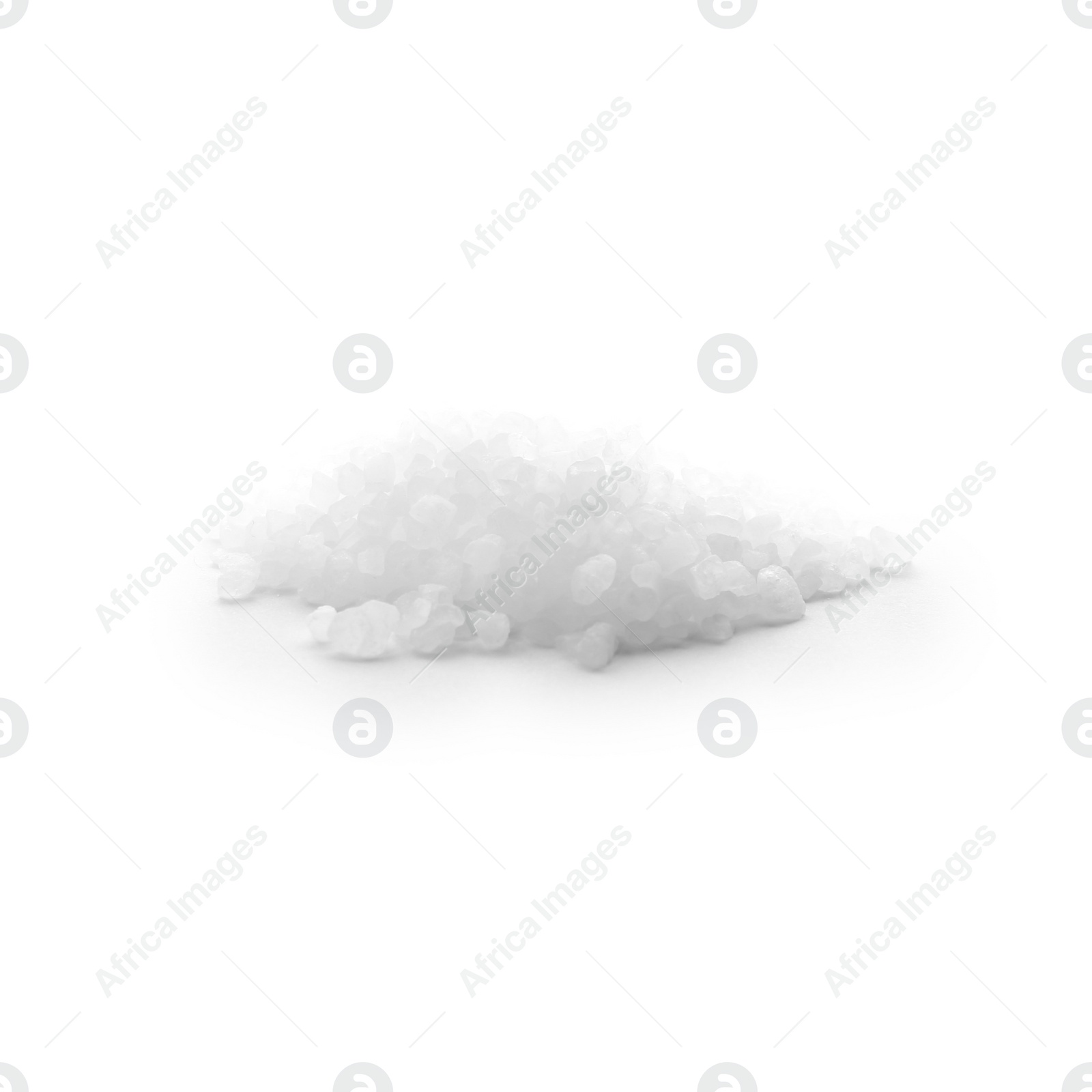 Photo of Pile of natural salt on white background