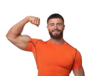 Photo of Young bodybuilder showing his muscular arm on white background
