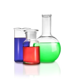 Photo of Laboratory glassware with different samples on white background. Solution chemistry