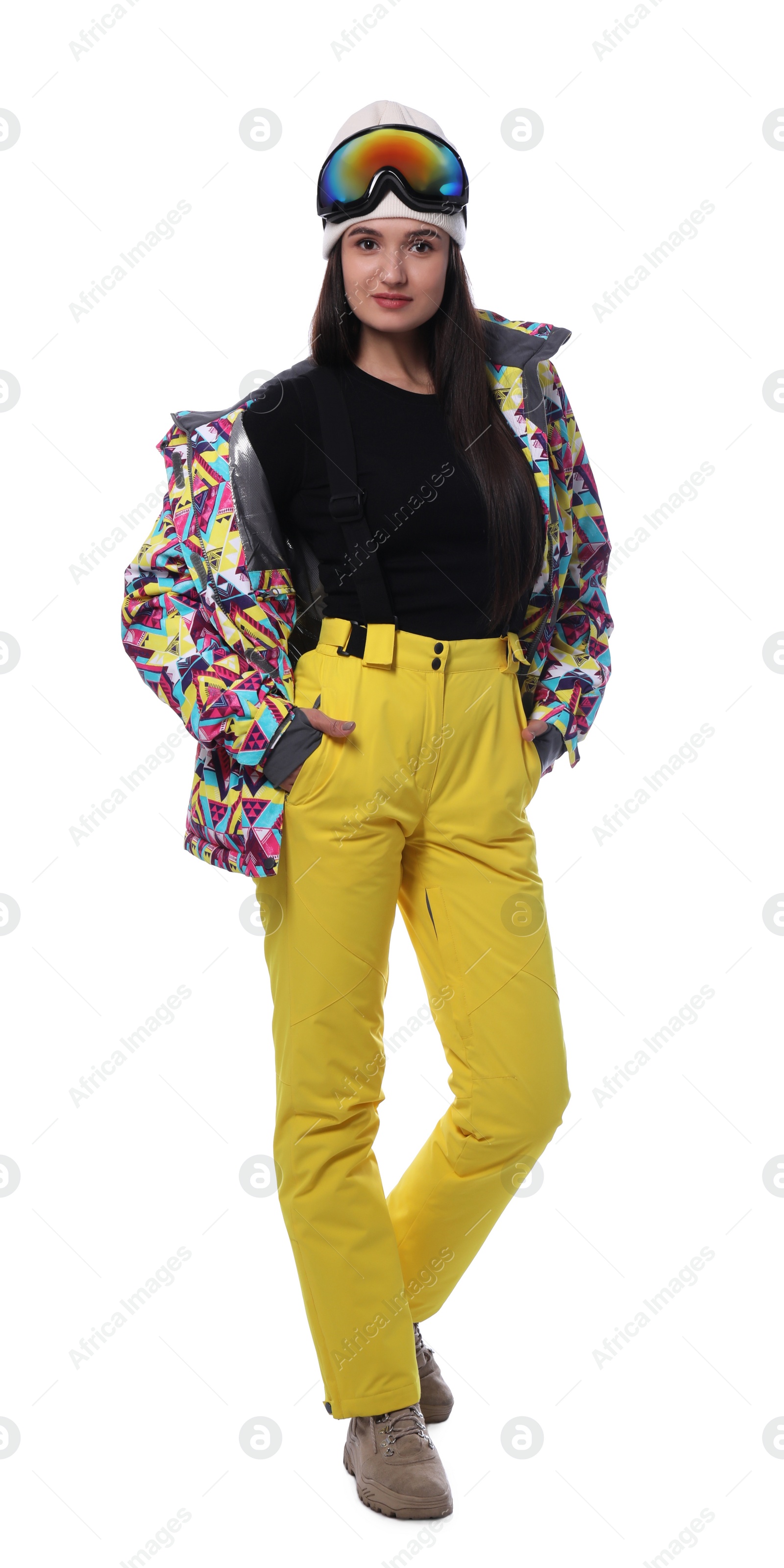 Photo of Woman wearing stylish winter sport clothes on white background