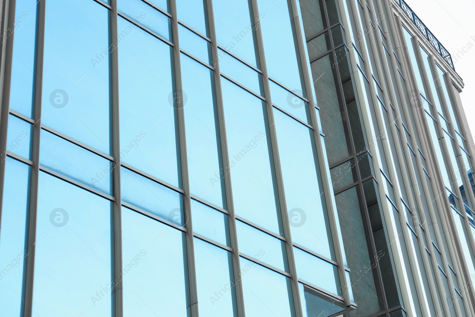 Photo of Modern building with tinted windows. Urban architecture