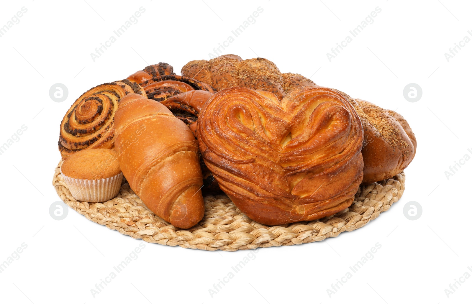 Photo of Wicker mat with different pastries isolated on white