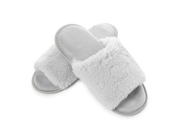 Pair of soft slippers with fur isolated on white