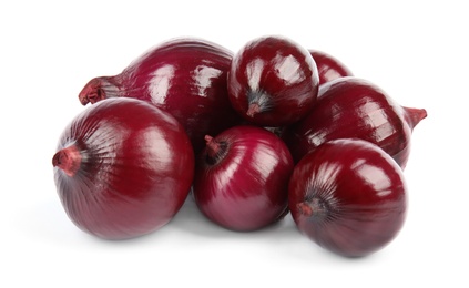 Photo of Fresh whole red onions on white background