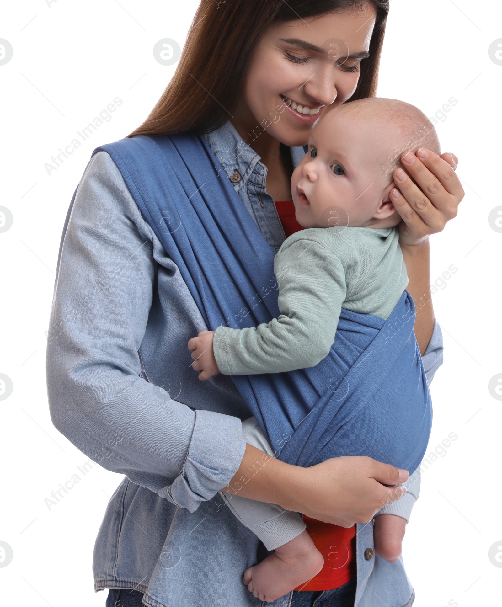 Photo of Mother holding her child in sling (baby carrier) on white background, closeup