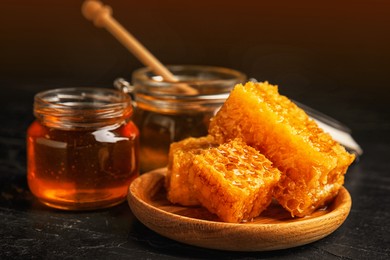 Image of Composition with fresh honey on black table