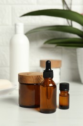 Bath accessories. Personal care products on white table, closeup