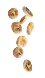 Image of Dried fig fruits falling on white background