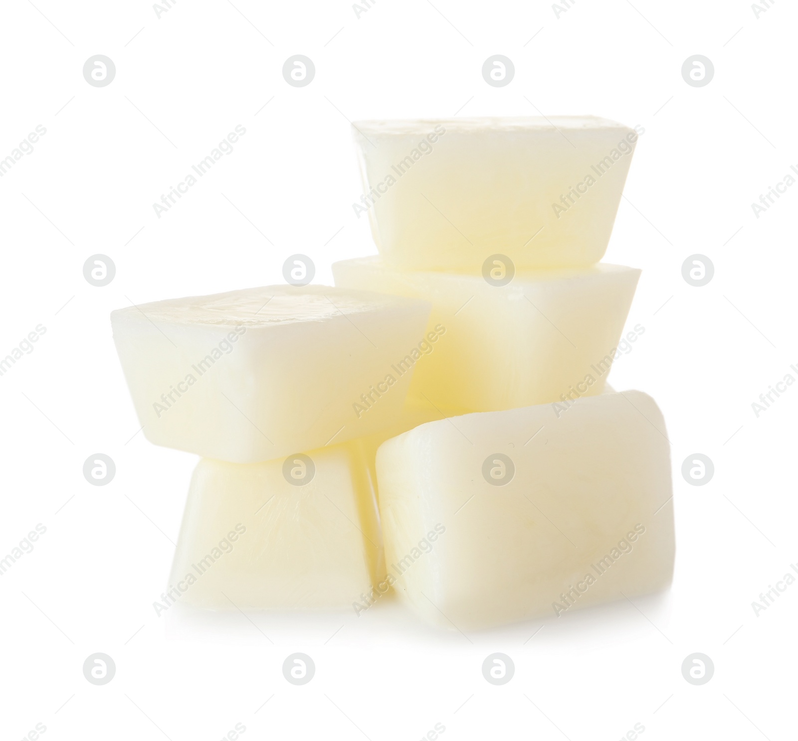 Photo of Tasty milk ice cubes on white background