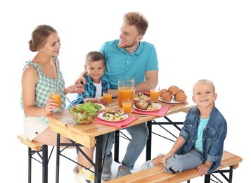 Photo of Happy family having picnic at table on white background