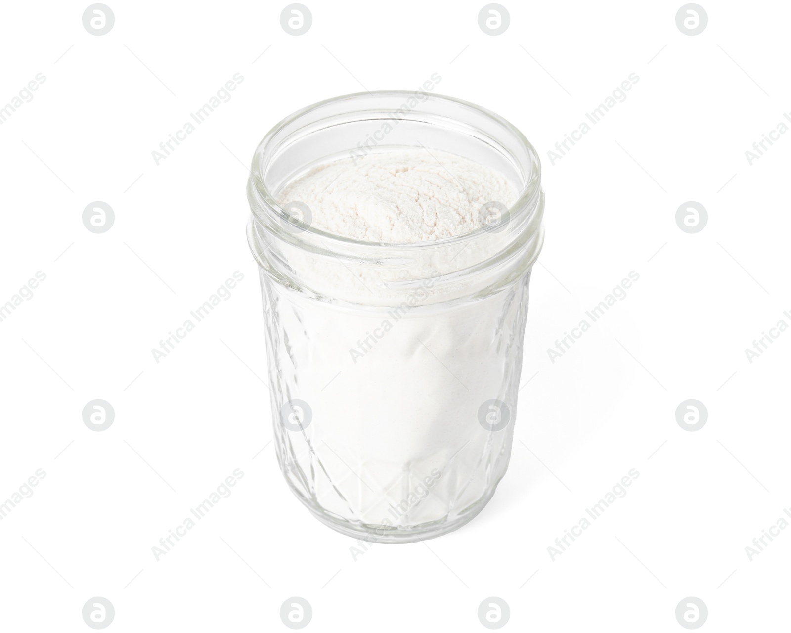 Photo of Baking powder in glass jar isolated on white