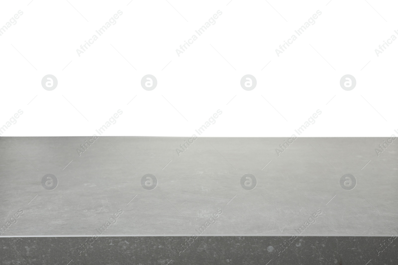 Photo of Empty stone surface against white background. Mockup for design