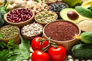 Photo of Different vegetables, seeds and fruits, closeup. Healthy diet