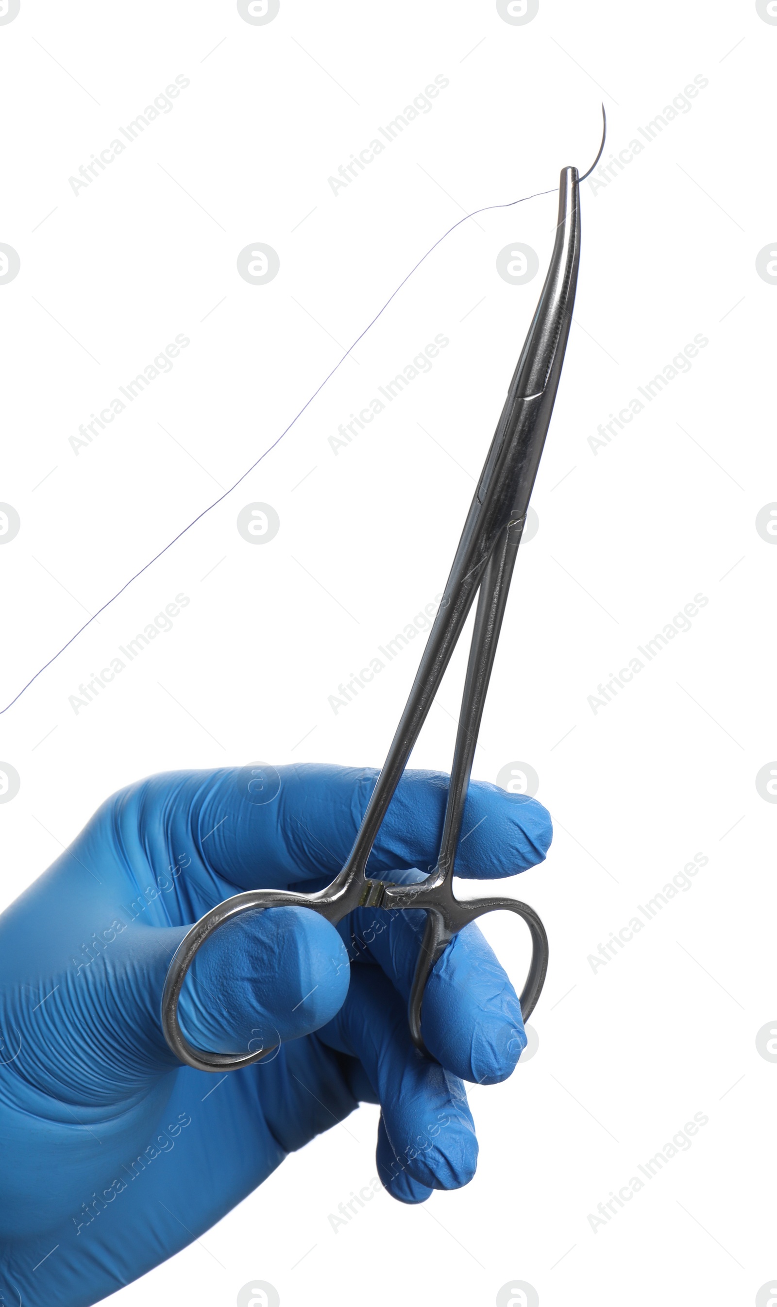 Photo of Doctor holding forceps with suture thread on white background, closeup. Medical equipment