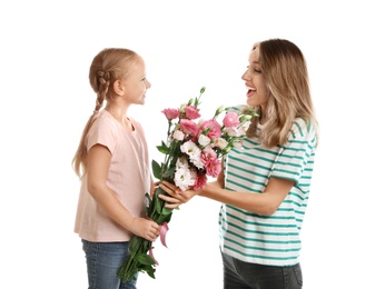 Photo of Little daughter congratulating her mom on white background. Happy Mother's Day