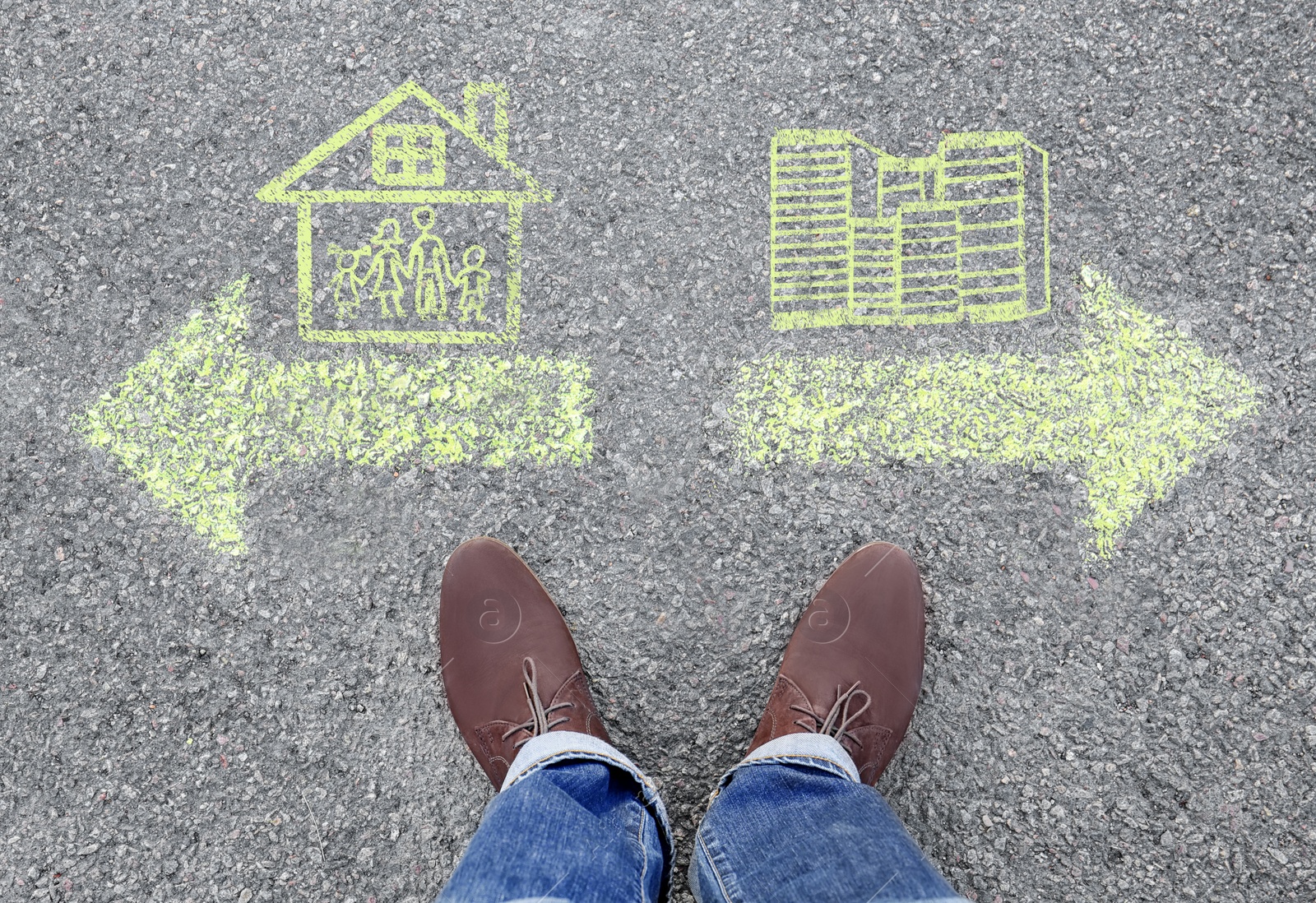 Image of Top view of man standing near arrows on asphalt, closeup. Concept of balance between life and work 