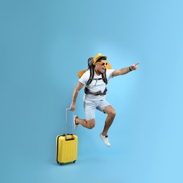 Photo of Emotional male tourist with travel backpack and suitcase jumping on turquoise background