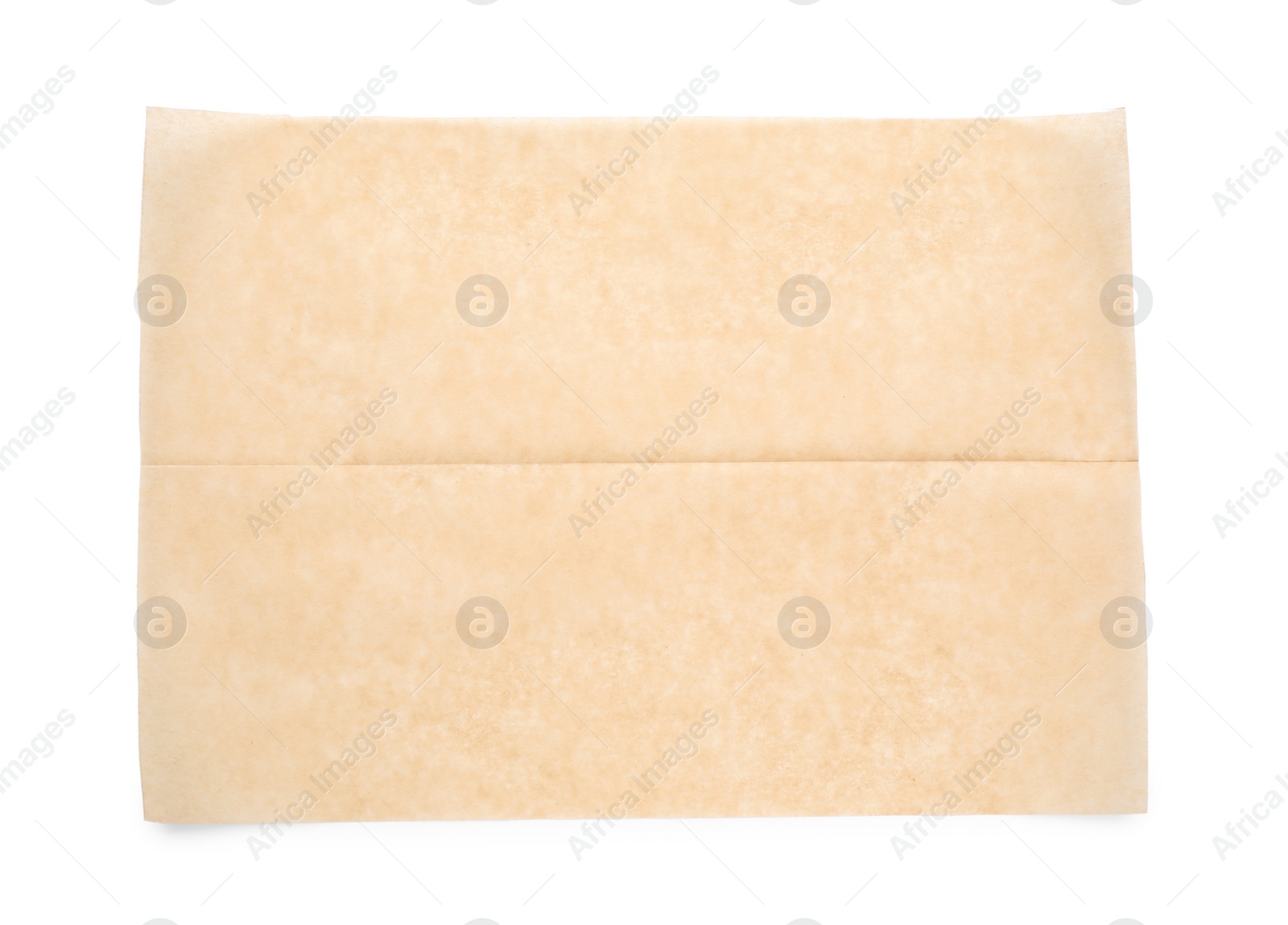 Photo of Sheet of brown baking paper on white background, top view