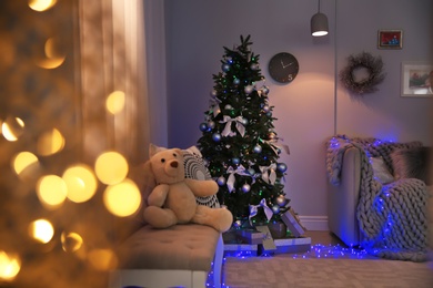 Room interior with beautiful Christmas tree and gifts