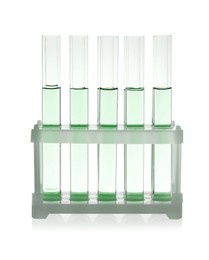 Test tubes with light green liquid in rack isolated on white