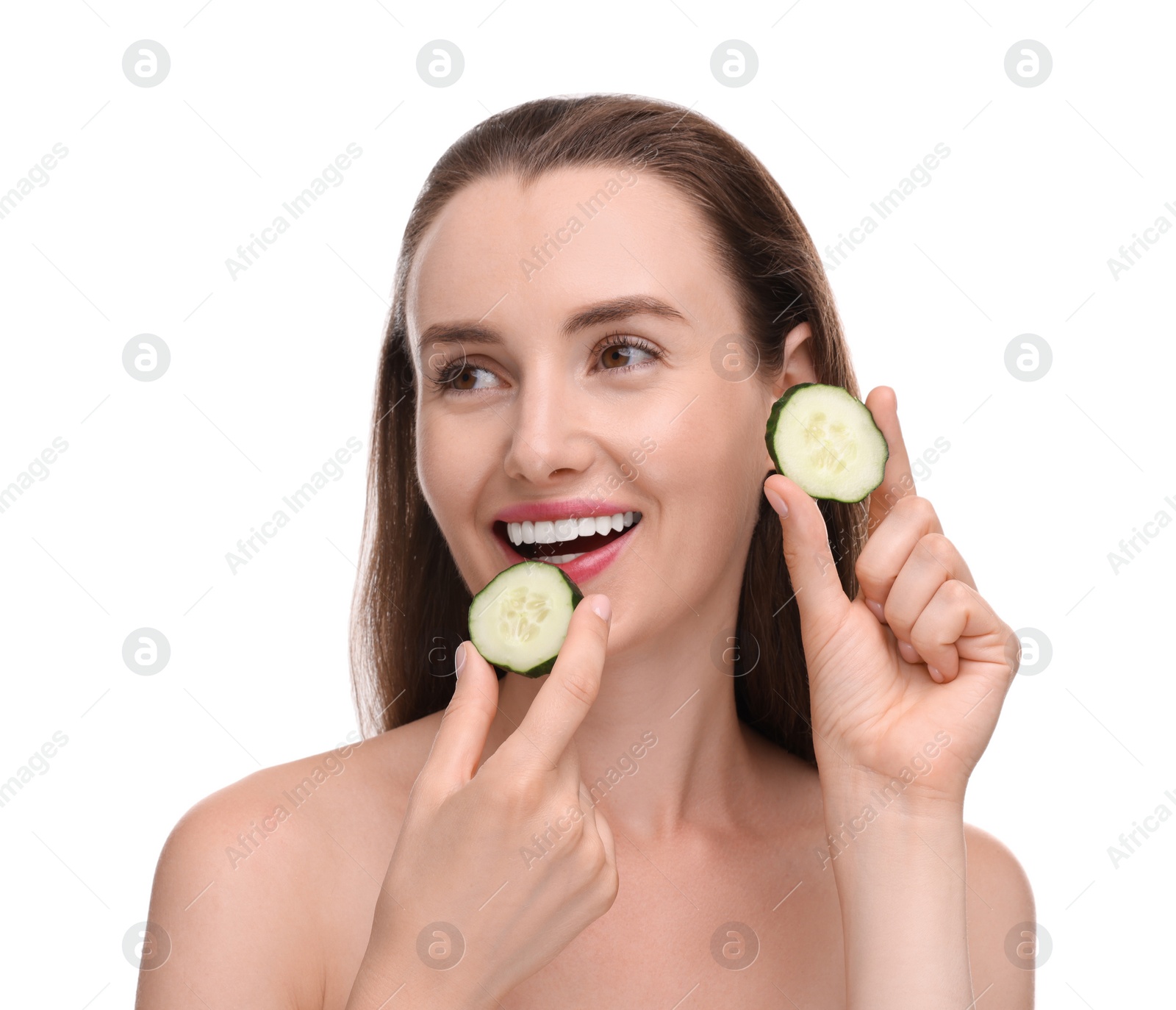 Photo of Beautiful woman with pieces of cucumber on white background