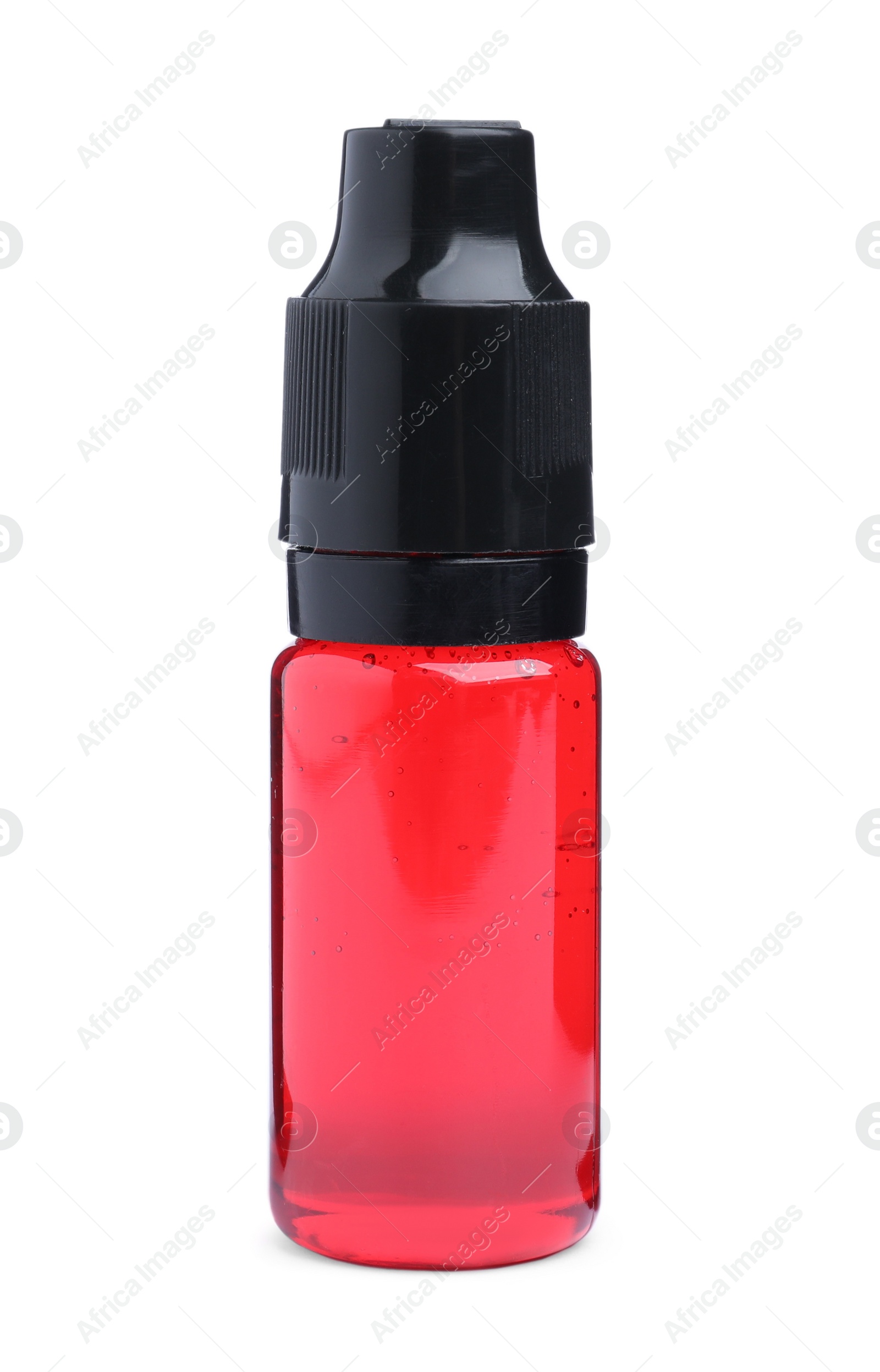 Photo of Bottle of red food coloring on white background