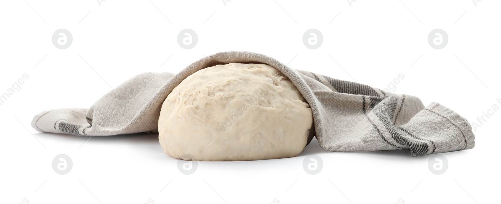 Photo of Dough for pastries covered with napkin on white background