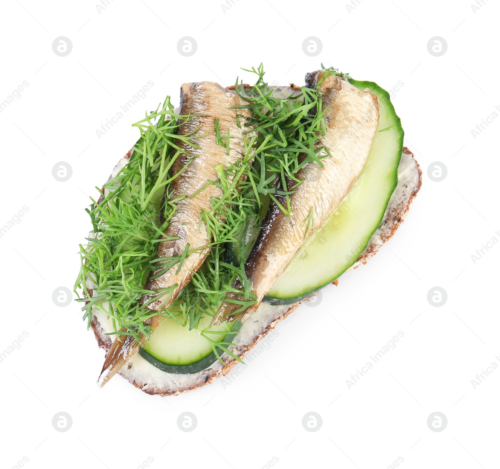 Delicious sandwich with smoked sprats, cucumber and dill isolated on white, top view Photo of Delicious sandwich with smoked sprats, cucumber and dill isolated on white, top view