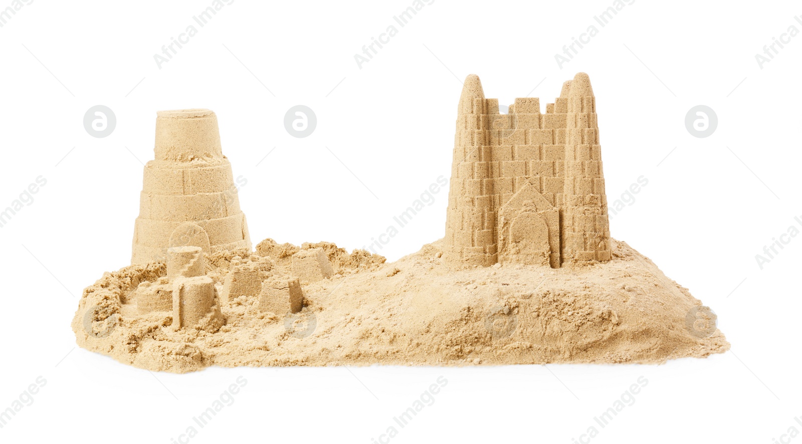 Photo of Pile of sand with beautiful castles isolated on white