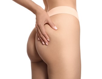 Closeup view of slim woman in underwear on white background. Cellulite problem concept