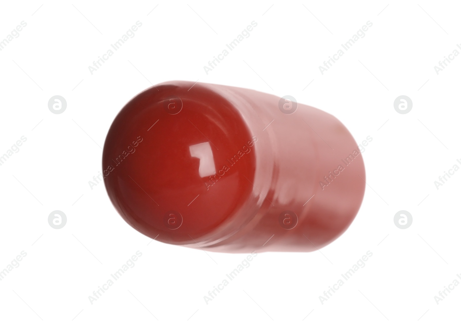 Photo of One red pill on white background. Medicinal treatment